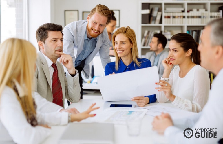 Project Manager meeting with his team