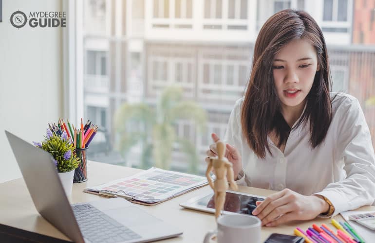 Graphic Designer working on her laptop