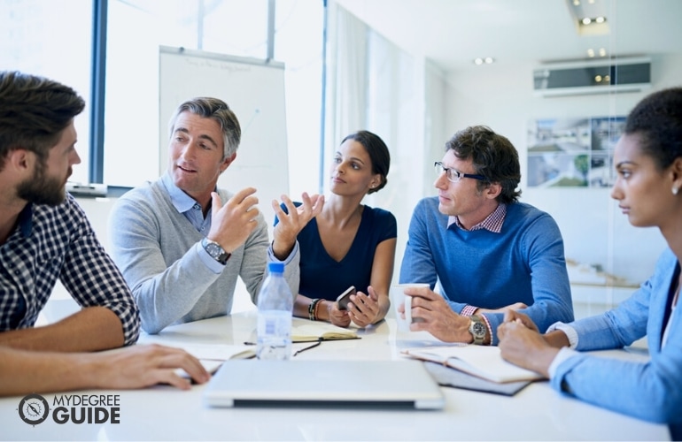 Members of Health Care Administrators Association, in a meeting