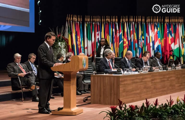 foreign diplomat giving a speech in an international conference