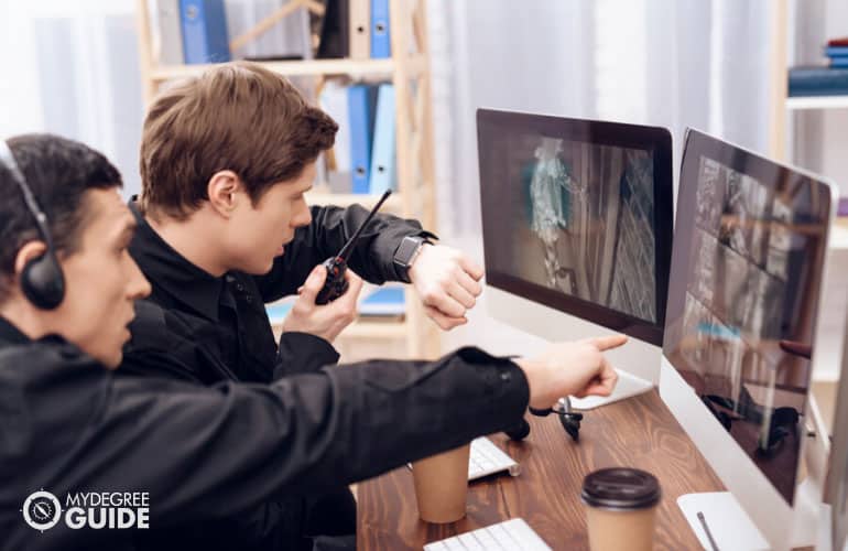 security specialist monitoring cctv cameras of a building