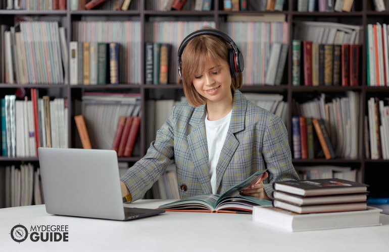 Forensic Psychology student studying in library