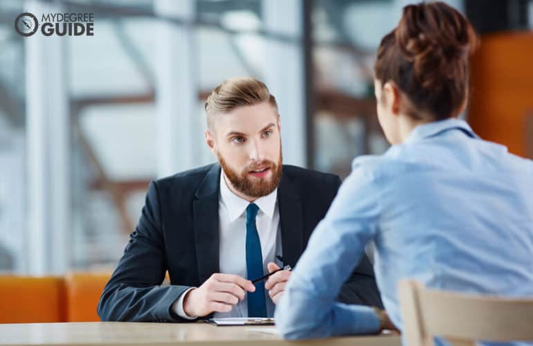 male human resource person interviewing an applicant