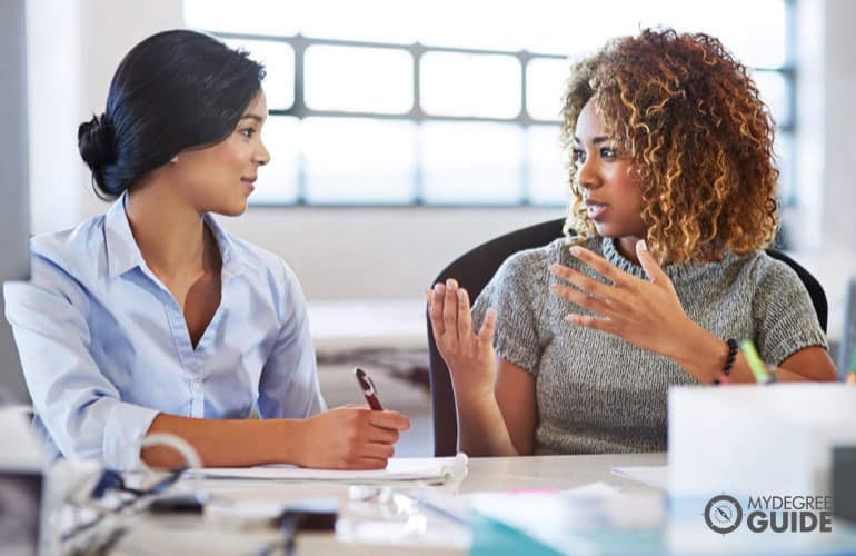 human services talking to a company's employee