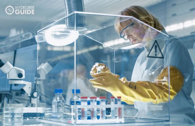 epidemiologist working in a quarantined laboratory