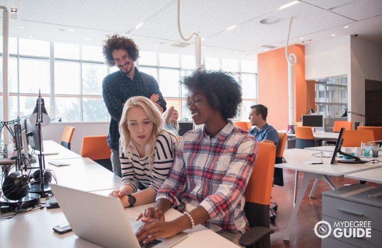 Computer Systems Analysts working 