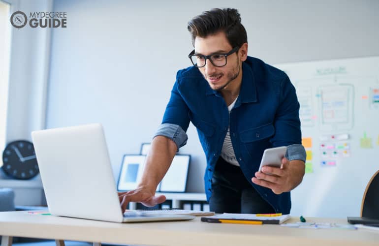 web developer working on his laptop