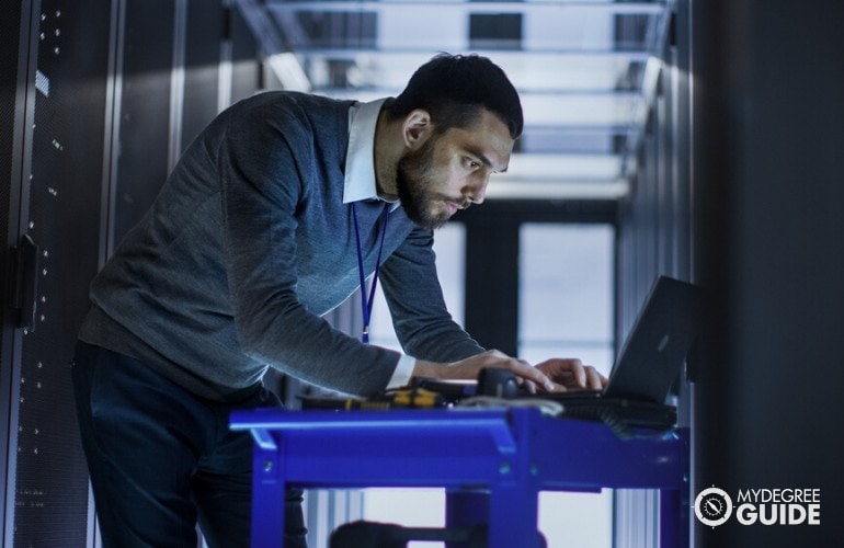 IT Specialist checking network in data center