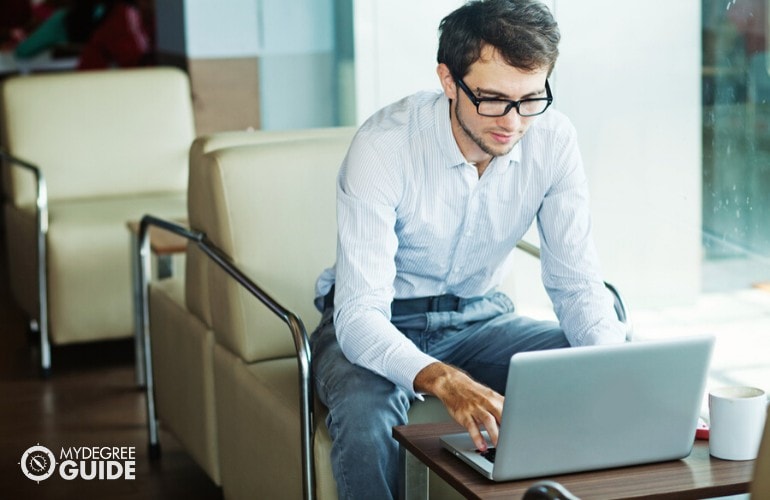 IT Specialist working on his laptop