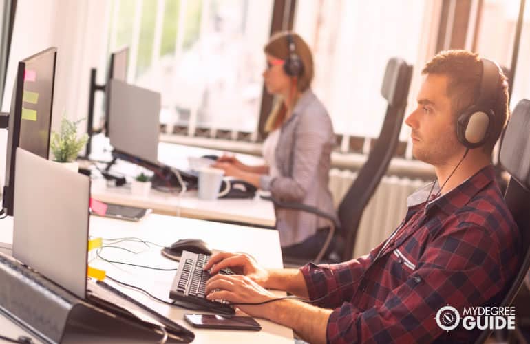 IT support specialists working in a modern office