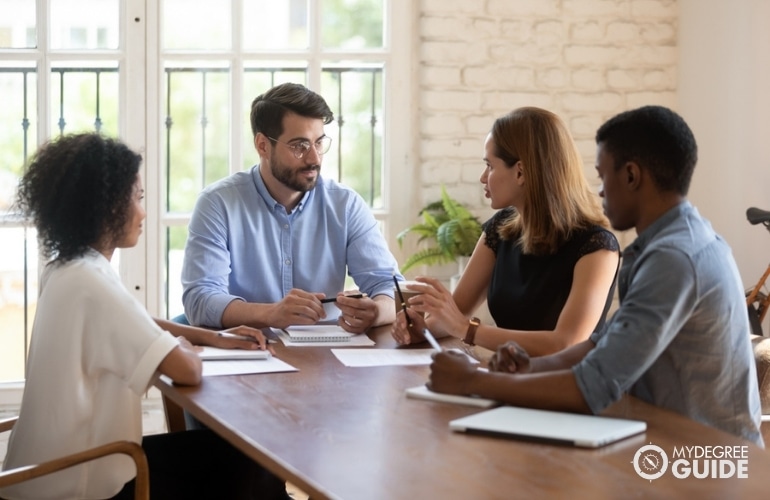 Instructional Coordinators in a meeting