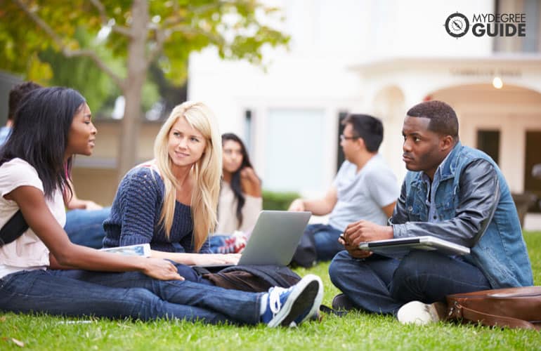 university students working together in college campus