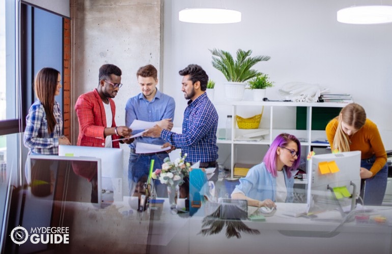 marketing team discussing in an office