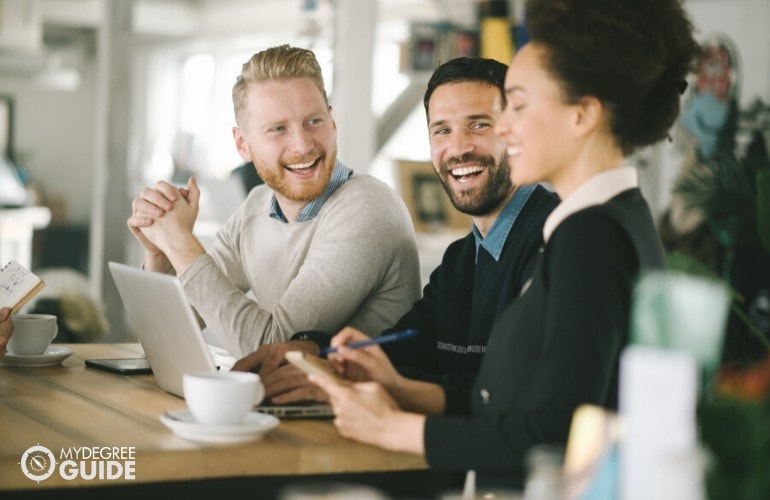 business professionals working at a cafe