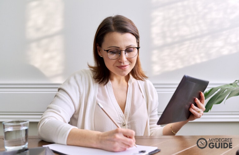 Forensic Psychologist working in her office