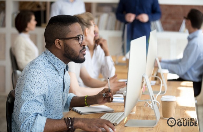 computer programmer working in an office