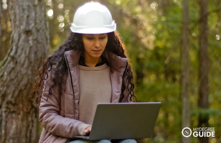 Environmental Engineer documenting her field work