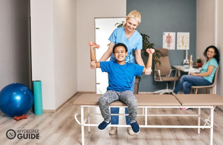 Occupational Therapist in a session with a child patient