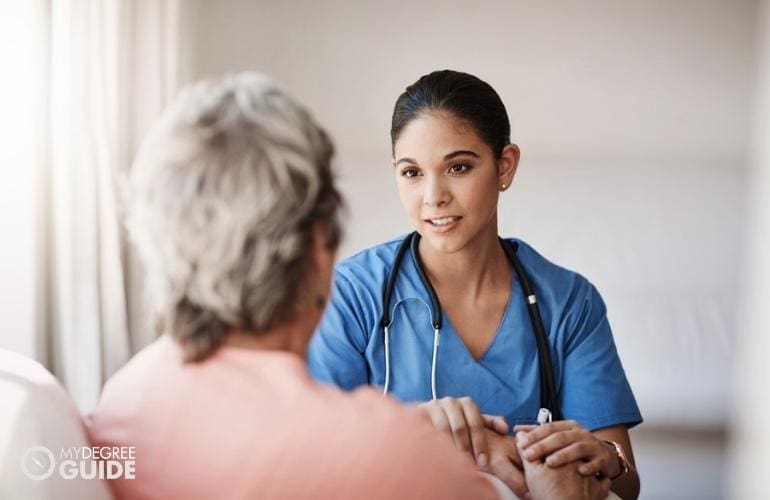 nurse comforting a patient