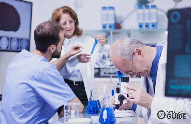 Biochemists working in the lab