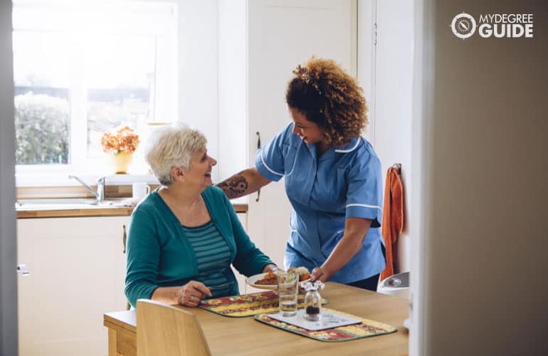 social worker taking care an elderly woman