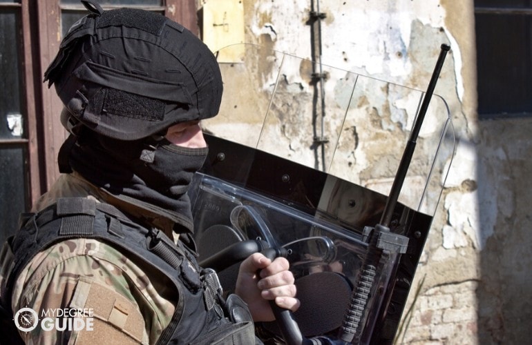 police officers wearing helmet and virus during a demonstration