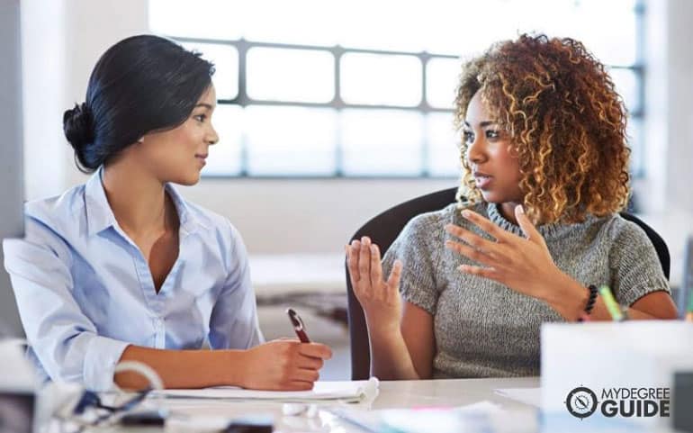 Two female lawyers talking