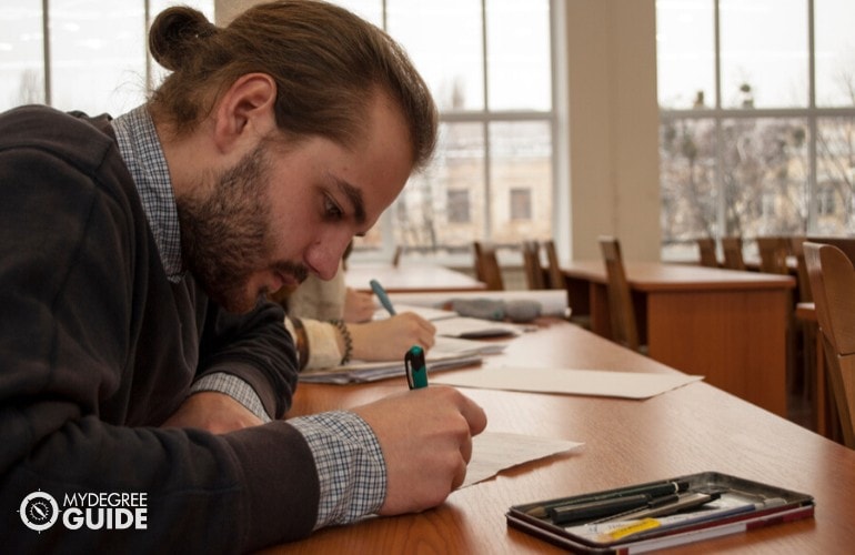 education degree student taking an exam