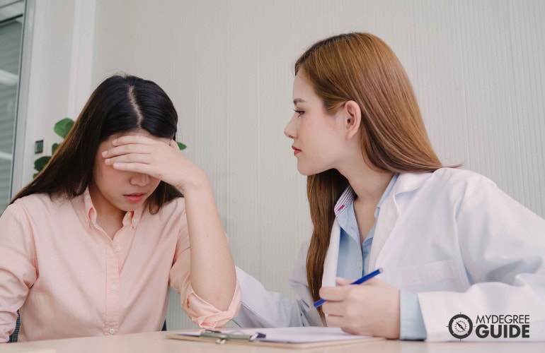 female substance abuse counselor with her female patient during a therapy session