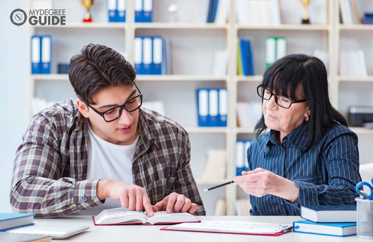 tutor teaching English to a student