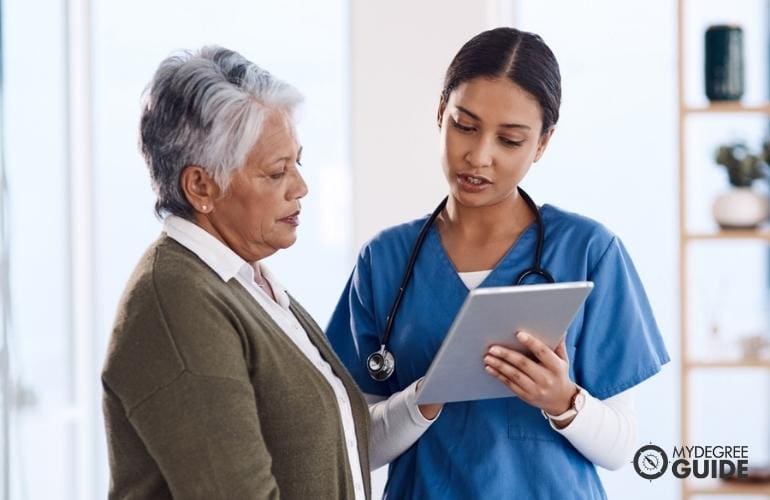 nurse explaining to patient