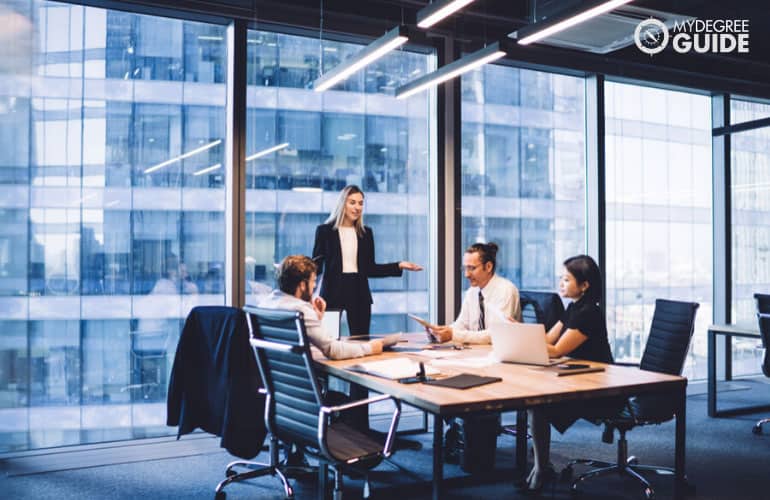 Financial Manager brainstorming with her team during a meeting