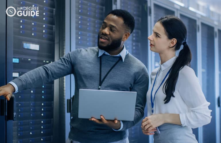 network administrators checking the data room