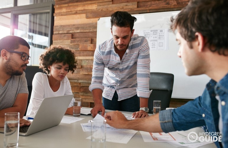 marketing researchers discussing during a meeting