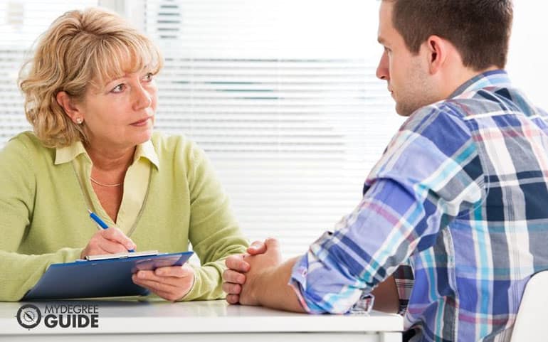 psychologist in a session with a patient