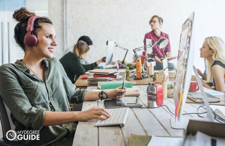  Graphic Design team working in their office