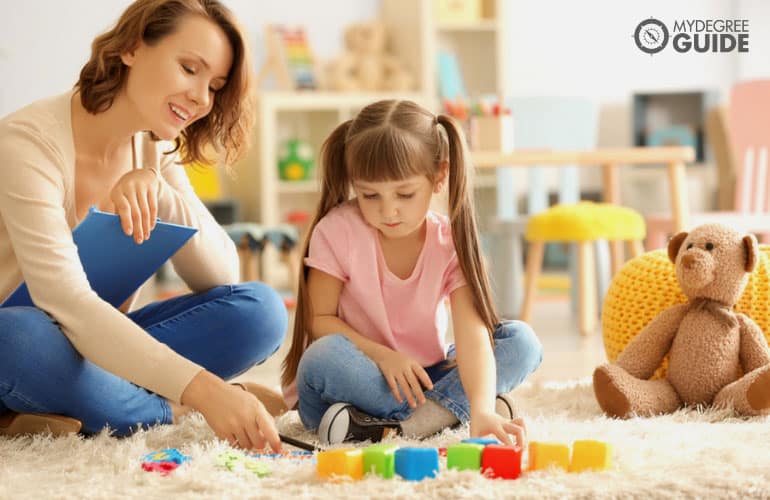 female psychologist with a child patient