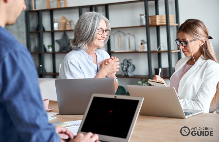 community service managers in a meeting