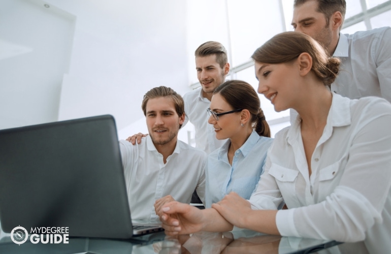 People taking Master’s in Health Education, in a group work