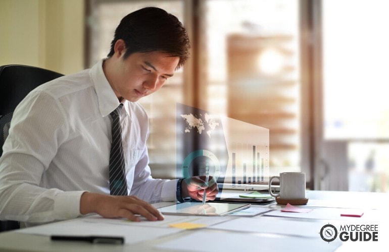 healthcare analytics consultant working in his office