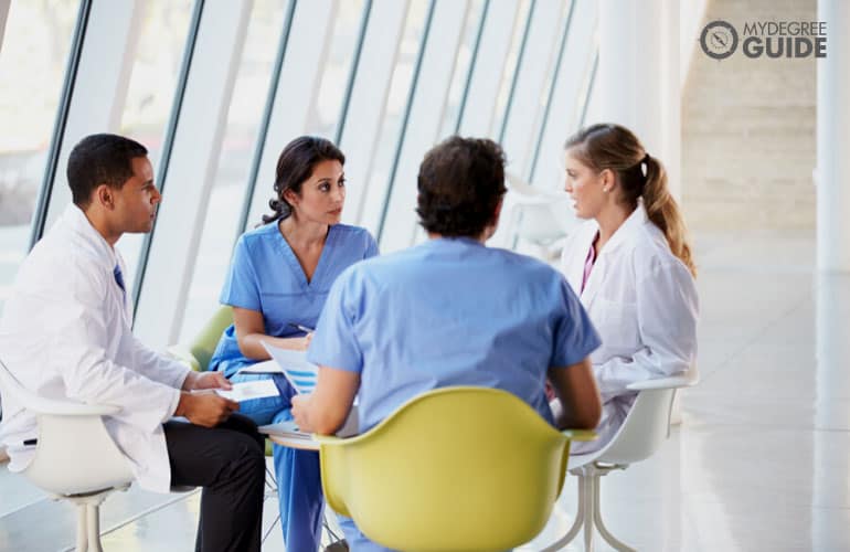 team of medical staff in a hospital having a meeting