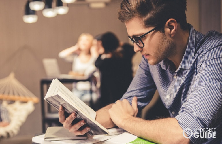 student reading in a modern library