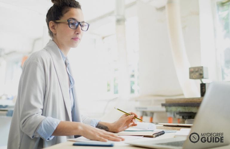 Woman completing her online Masters Degree in Journalism 