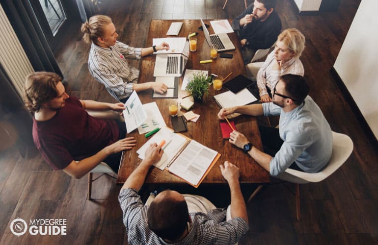 professionals having a meeting in an office