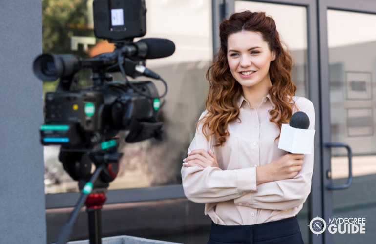 female reporter about to deliver news