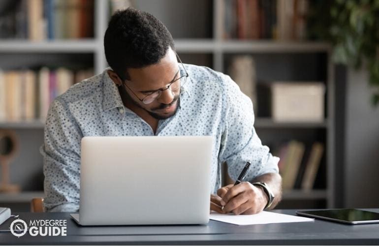 Man preparing requirements for Masters in Organizational Management