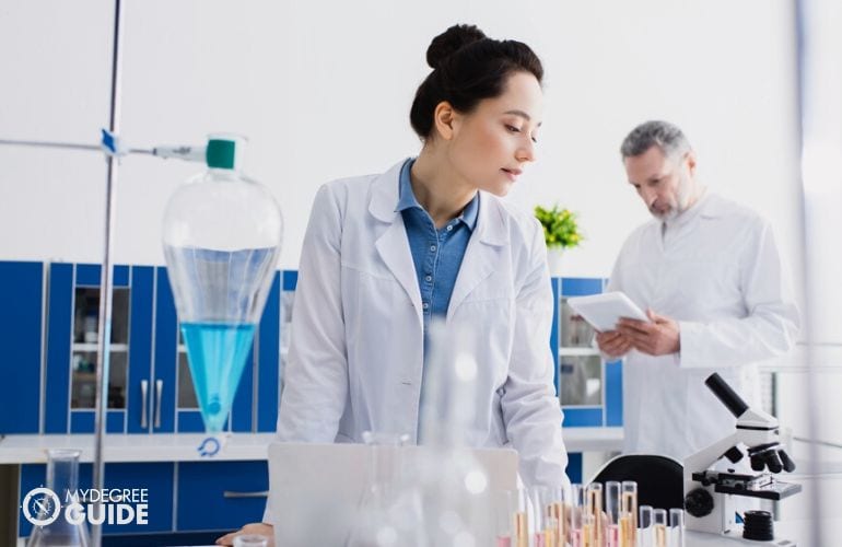 Biochemists working in their lab