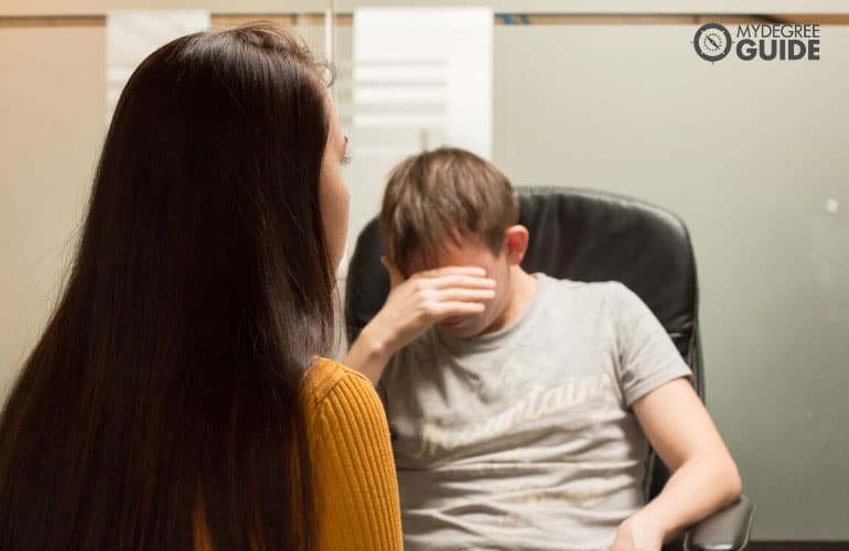 psychologist talking to a patient