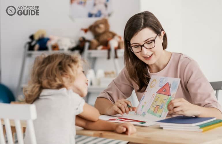 therapist and child during therapy session