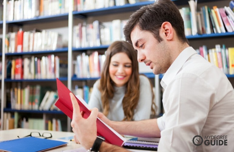 Public Administration student researching in library